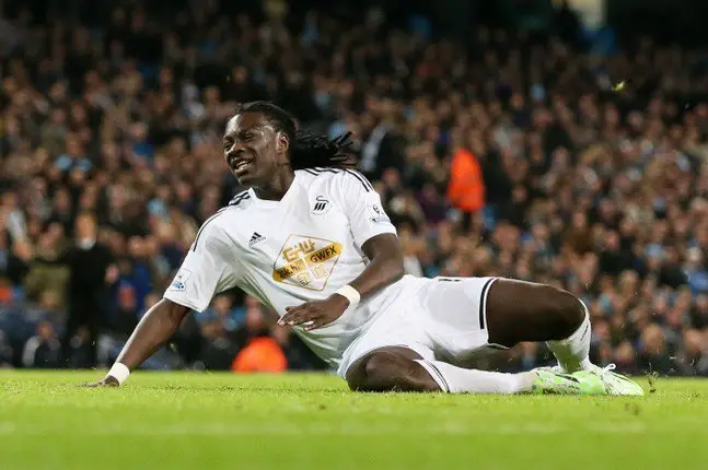 Swansea's Bafetimbi Gomis looks dejected after missing a chance to score