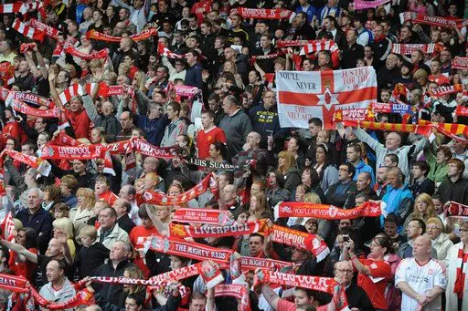 Pic Shows.. Liverpool FC fans, at Anfield, for the 22nd anniversary service of the Hillsborough disaster. Pictured here are fans at the service.. See Copy