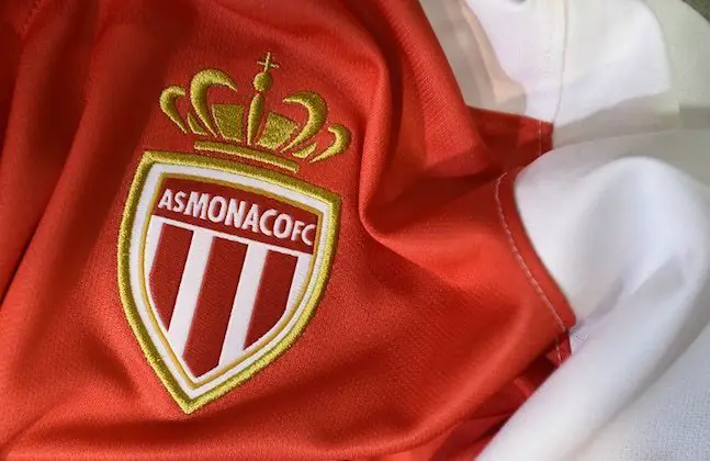 A photo taken on August 6, 2015 in Paris, shows a partial view of the new jersey of the Monaco (ASM) football team. AFP PHOTO / FRANCK FIFE / AFP PHOTO / FRANCK FIFE