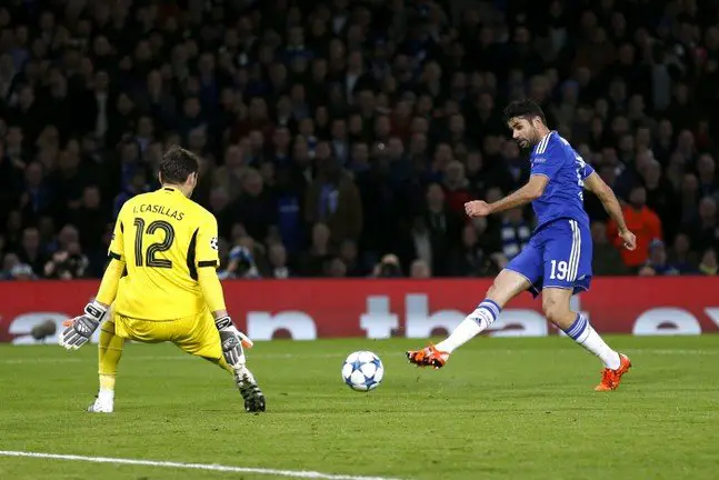 Diego Costa shoots which results in Ivan Marcano scoring an own goal for Chelsea's first goal