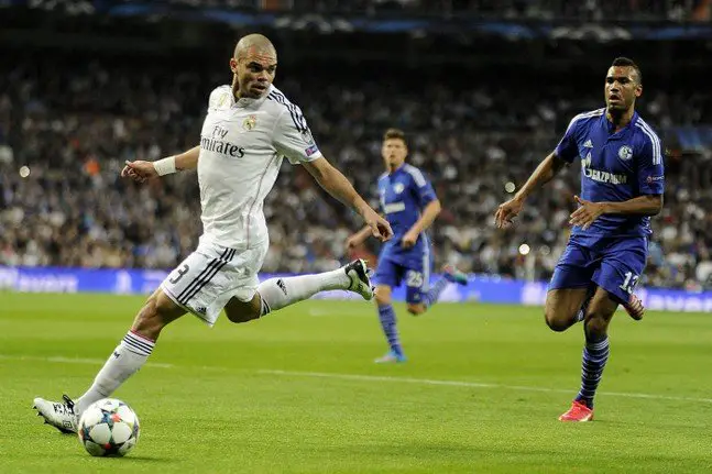 Real Madrid Pepe and FC Shalke 04 Eric Maxim Choupo-Moting