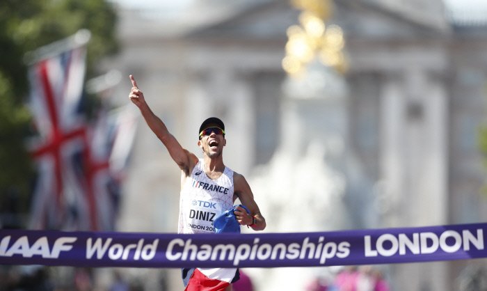 Athletics - World Athletics Championships ­ men¹s 50 km walk ­ London Stadium, London, Britain ­ August 13, 2017 ­ Yohann Diniz of France crosses the finish line to win the gold medal.