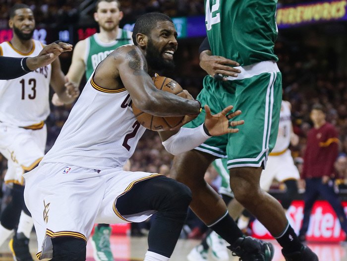 May 21, 2017 - Cleveland, OH, USA - Cleveland Cavaliers guard Kyrie Irving drives the ball low against Boston Celtics center Al Horford during the first quarter in Game 3 of a third round Eastern Conference playoff game on Sunday, May 21, 2017, in Cleveland, Ohio.