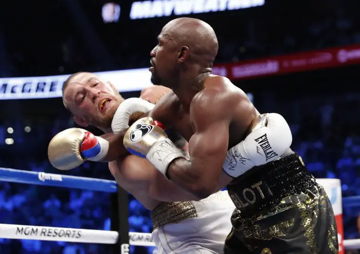 Boxing - Floyd Mayweather Jr. vs Conor McGregor - Las Vegas, USA - August 26, 2017  Floyd Mayweather Jr. in action with Conor McGregor
