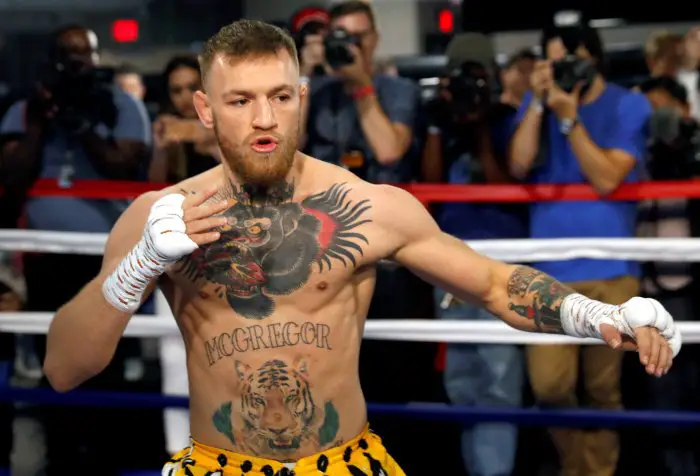 Conor McGregor of Ireland warms up in a boxing ring during a workout at the UFC Performance Center in Las Vegas, Nevada, U.S., August 11, 2017.