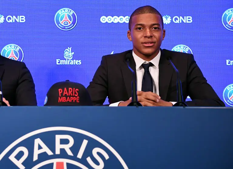 Paris Saint-Germain's new forward Kylian Mbappe speaks during a press conference on his presentation at the Parc des Princes stadium in Paris on September 6, 2017.
The 18-year-old striker moved to PSG in a season-long loan deal with a 180 million euro buy-out clause attached, making him the second most expensive player of all time behind new teammate Neymar. / AFP PHOTO / FRANCK FIFE
