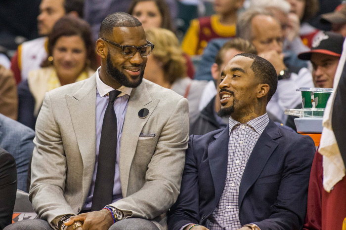 Cleveland Cavaliers forward LeBron James (23) and guard J.R. Smith (5)