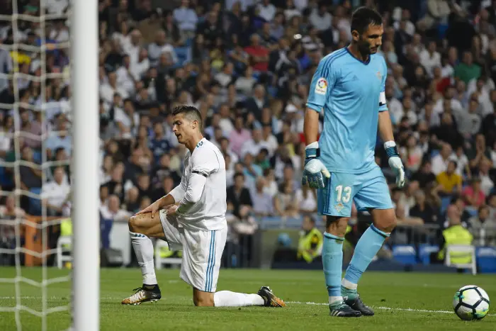 Cristiano Ronaldo dos Santos (7) Real Madrid's player. Antonio¬ÝAdan (13) Betis CF's player. La Liga between Real Madrid vs Betis CF at the Santiago Bernabeu stadium in Madrid, Spain, September 20, 2017 .