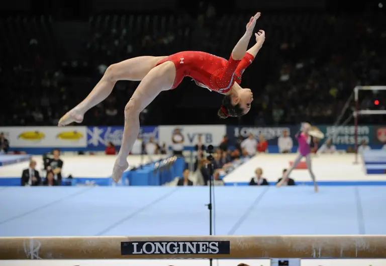 (FILES) This file photo taken on October 2, 2013 shows US gymnast McKayla Maroney competing on uneven bars during the 44th Artistic Gymnastics World Championships in Antwerp.  
Olympic gold medal-winning US gymnast McKayla Maroney, inspired by the "Me Too" movement, revealed on October 18, 2017 that she was molested for years by former USA Gymnastics team doctor Larry Nassar. Maroney, 21, said in a statement on Twitter that Nassar, who is facing trial on more than 20 counts of sexual assault, began molesting her at the age of 13 and it continued throughout her gymnastics career. / AFP PHOTO / JOHN THYS