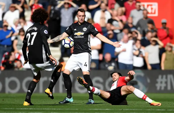 Soccer Football - Premier League - Southampton vs Manchester United - St Mary's Stadium, Southampton, Britain - September 23, 2017   Southampton's Shane Long in action with Manchester United's Phil Jones