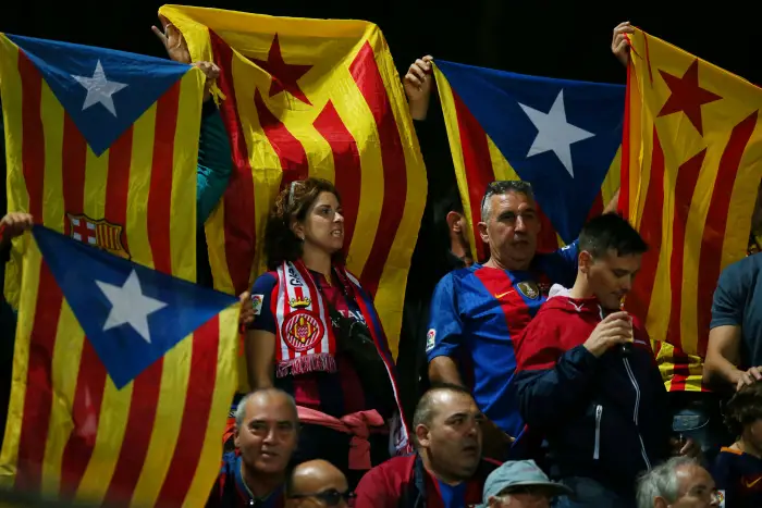 Soccer Football - Santander La Liga - Girona vs FC Barcelona - Estadi Montilivi, Girona, Spain - September 23, 2017   Barcelona fans hold up Catalonia flags