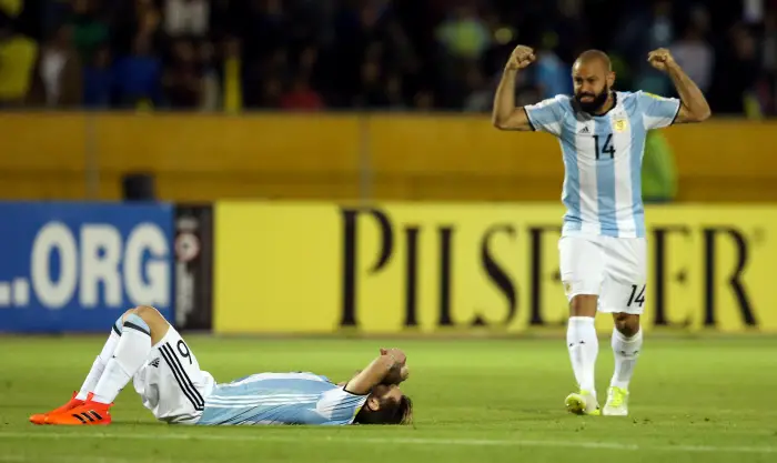 Argentina's Javier Mascherano and Lucas Biglia react at the end of the match