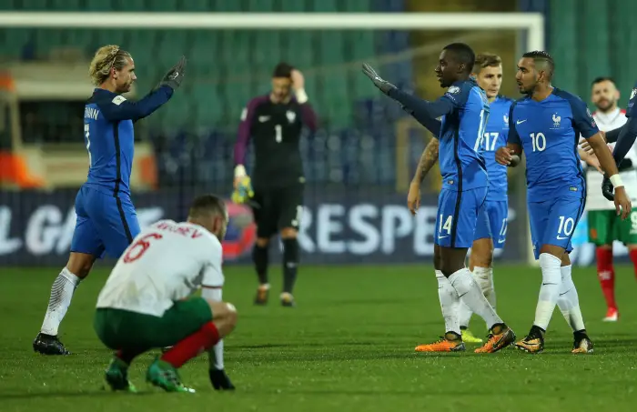 Soccer Football - 2018 World Cup Qualifications - Europe - Bulgaria vs France - Vasil Levski National Stadium, Sofia, Bulgaria - October 7, 2017   France's Antoine Griezmann celebrates with Blaise Matuidi while Bulgaria¹s Simeon Slavchev looks dejected after the match