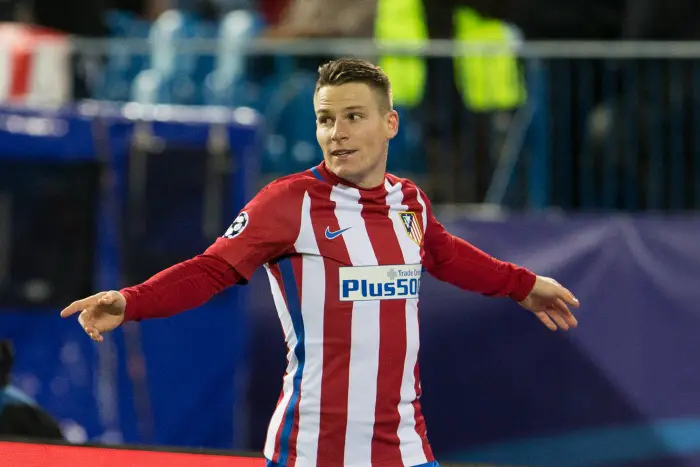 Atletico Madrids French forward Kevin Gameiro celebrating after scoring