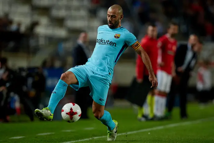 Mascherano of FC Barcelona controls the ball