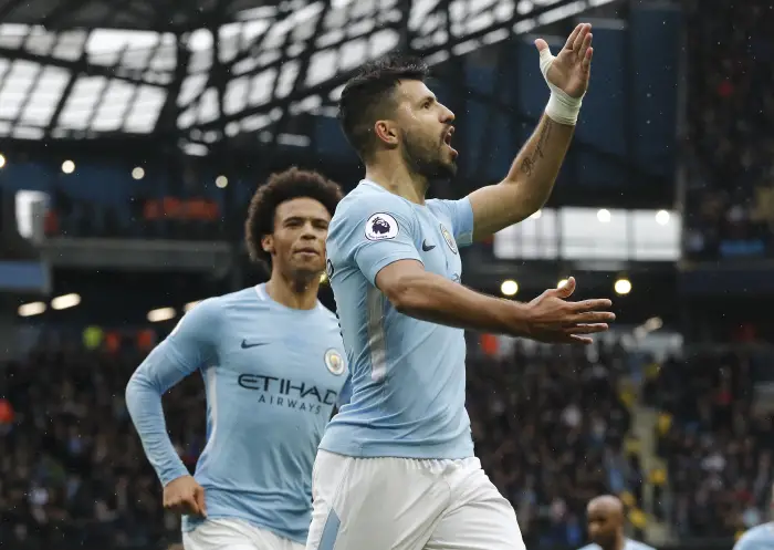 21st October 2017, Etihad Stadium, Manchester, England; EPL Premier League football, Manchester City versus Burnley;  Sergio Aguero of Manchester City celebrates with Leroy Sane after scoring his team's first goal  from a penalty after 30 minutes