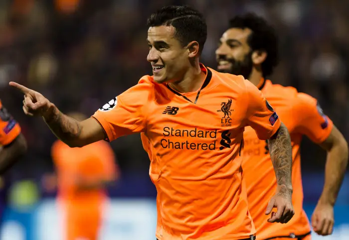 Midfielder Philippe Coutinho of Liverpool celebrates the goal for 0-2