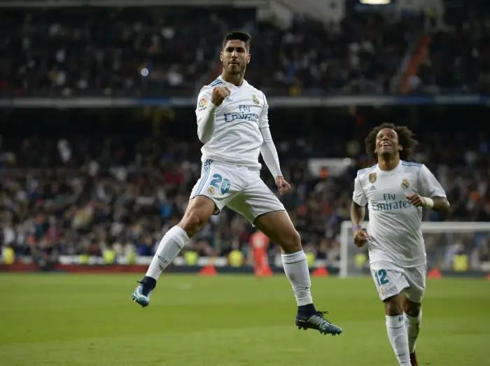 Real Madrid's  Marco Asensio celebrates goal and UD Las Palmas'  during La Liga match. November 5,2017.