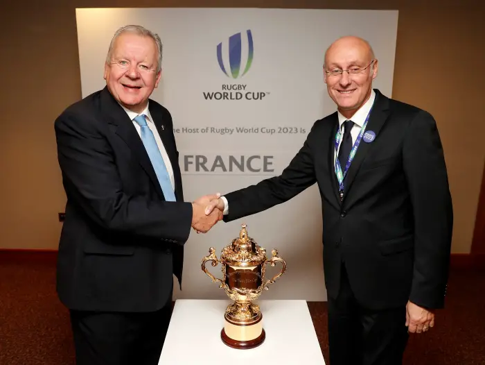 Rugby Union - Rugby World Cup 2023 Host Country Announcement - Royal Garden Hotel, London, Britain - November 15, 2017   Bill Beaumont Chairman of World Rugby and Bernard Laporte, President of the Federation Francaise de Rugby pose for a photograph with the Webb Ellis Trophy
