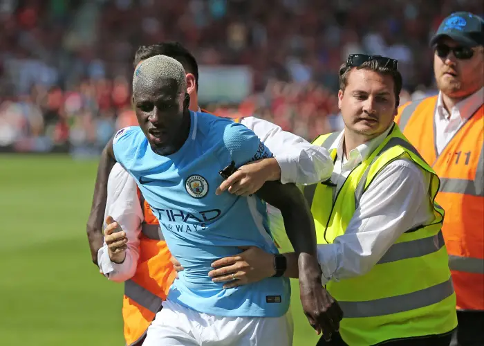 26th August 2017, Vitality Stadium, Bournemouth, England; EPL Premier League football, Bournemouth versus Manchester City;    As The Manchester City team celebrate Raheem Sterling's 94th minute winning goal, Benjamin Mendy of Manchester City is escorted back onto the pitch by stewards