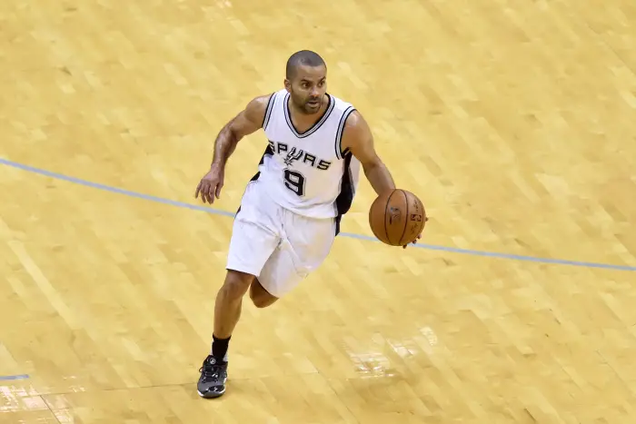 San Antonio Spurs guard Tony Parker runs down court during the first quarter