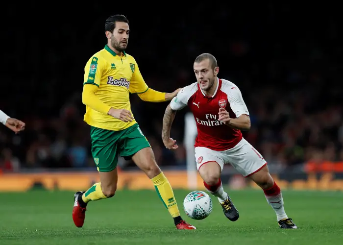 Arsenal's Jack Wilshere in action with Norwich City's Mario Vrancic