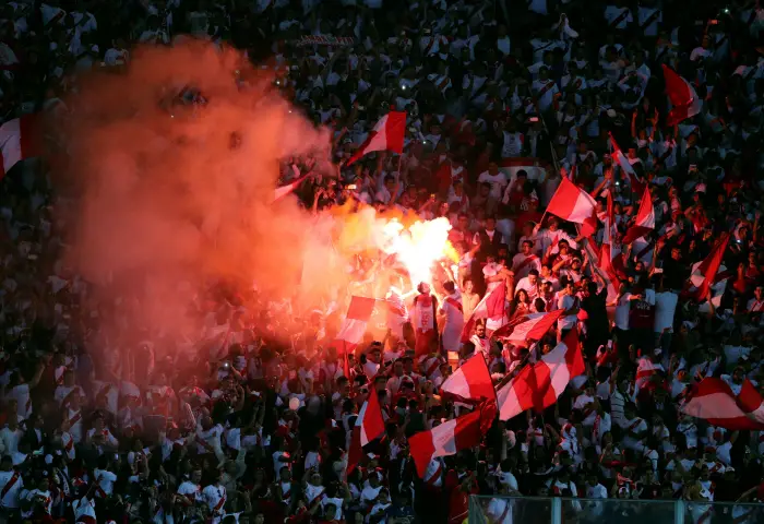 Peru's fans celebrate after their victory.