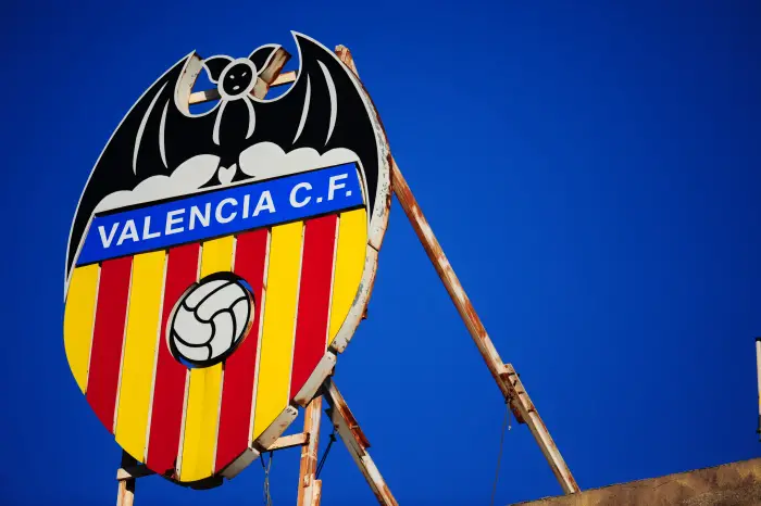 A general view of a giant Valencia club crest at the top of the Mestalla Stadium
logo