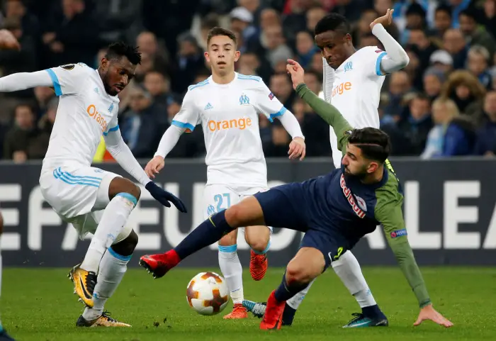 Soccer Football - Europa League - Olympique de Marseille vs RB Salzburg - Orange Velodrome, Marseille, France - December 7, 2017   RB Salzburg's Moanes Dabour in action with Marseille's Andre-Frank Zambo Anguissa and Maxime Lopez