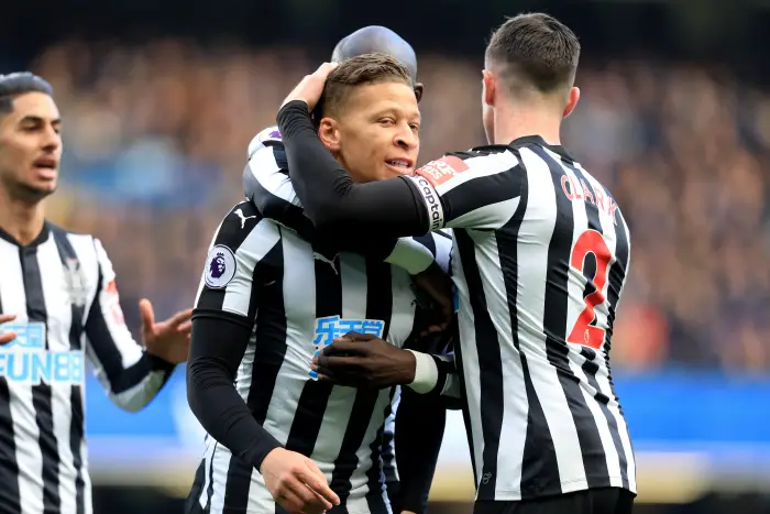 2nd December 2017, Stamford Bridge, London, England; EPL Premier League football, Chelsea versus Newcastle United; Dwight Gayle of Newcastle United celebrates with Mohamed Diamé and Ciaran Clark after scoring as he makes it 0-1