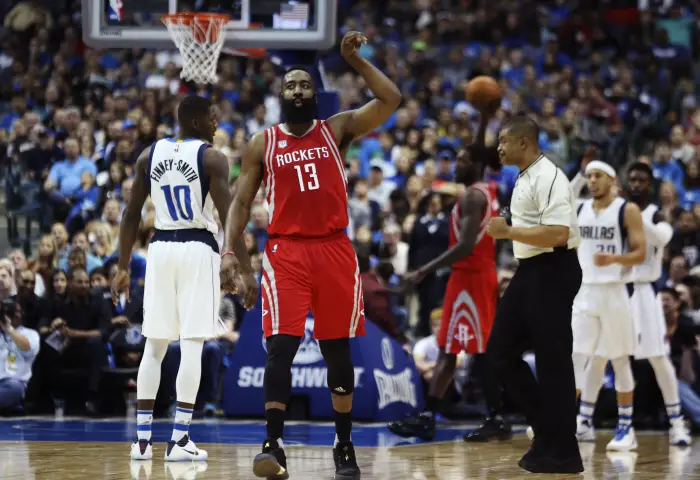 Dec 27, 2016; Dallas, TX, USA; Houston Rockets guard James Harden (13) reacts after scoring during the first half against the Dallas Mavericks at American Airlines Center.