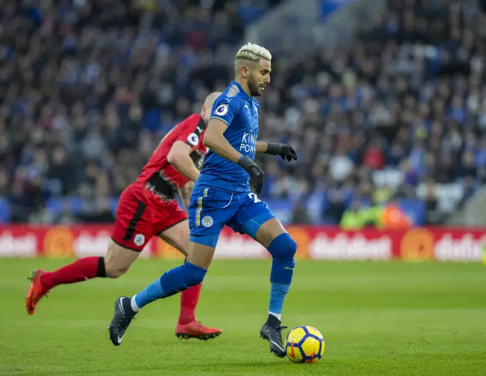 1st January 2018, King Power Stadium, Leicester, England; EPL Premier League Football, Leicester City versus Huddersfield Town; Riyad Mahrez of Leicester City on the attack with the ball past Aaron Mooy of Huddlesfield Town