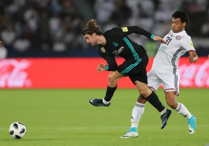 Soccer Football - FIFA Club World Cup Semi Final - Al Jazira vs Real Madrid - Zayed Sports City Stadium, Abu Dhabi, United Arab Emirates - December 13, 2017   Al Jazira¹s Romarinho in action with Real Madrid¹s Mateo Kovacic