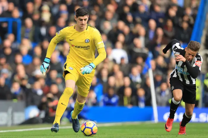 2nd December 2017, Stamford Bridge, London, England; EPL Premier League football, Chelsea versus Newcastle United; Thibaut Courtois of Chelsea is under pressure from Dwight Gayle of Newcastle United