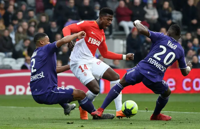 Soccer Football - Ligue 1 - Toulouse vs AS Monaco - Stadium Municipal de Toulouse, Toulouse, France - February 24, 2018   Monaco's Keita Balde Diao in action with Toulouse's Steeve Yago and Kelvin Amian