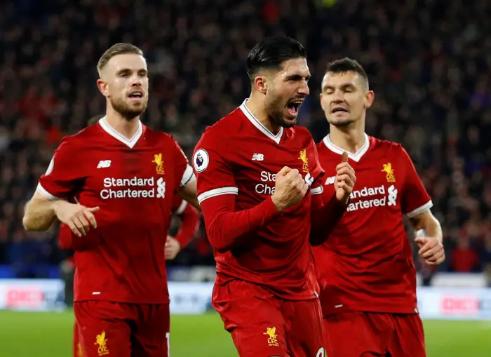 Liverpool's Emre Can celebrates scoring their first goal with team mates