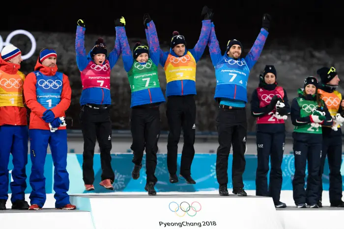 PYEONGCHANG,SOUTH KOREA,20.FEB.18 - OLYMPICS, BIATHLON - Olympic Winter Games PyeongChang 2018, 2 x 6km and 2 x 7.5km, mixed relay. Image shows Marie Dorin Habert,Anais Bescond ,Simon Desthieux and Martin Fourcade (FRA).