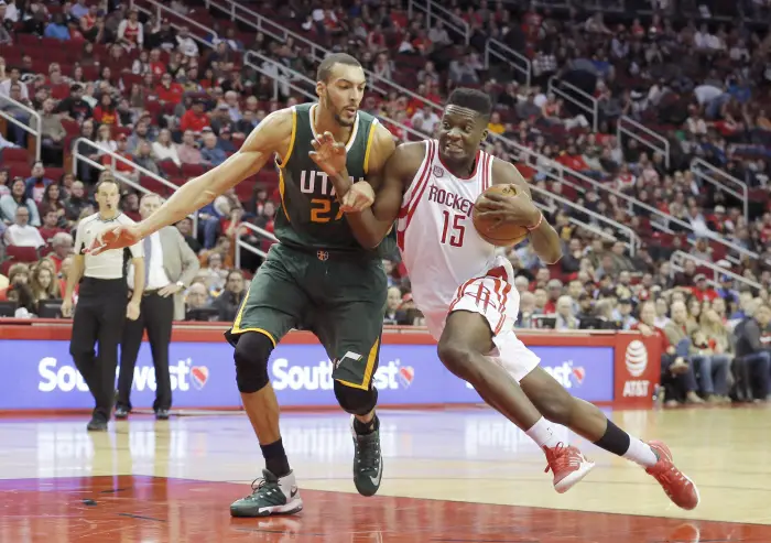 Houston Rockets center Clint Capela (15) drives to the basket against Utah Jazz center Rudy Gobert (27) in the second half at Toyota Center. Rockets won 111-102.