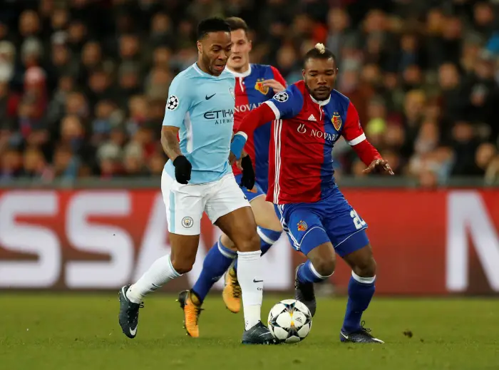Manchester City's Raheem Sterling in action with BaselÄôs Serey Die
