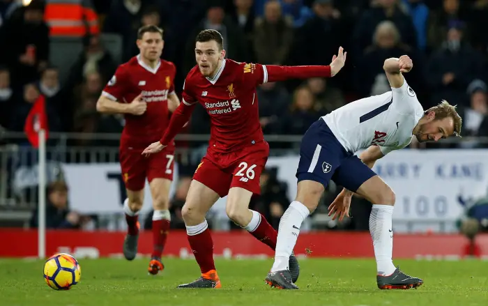 Liverpool's Andrew Robertson in action with Tottenham's Harry Kane