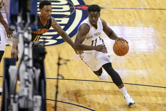 New Orleans Pelicans guard Jrue Holiday (11) drives to the basket