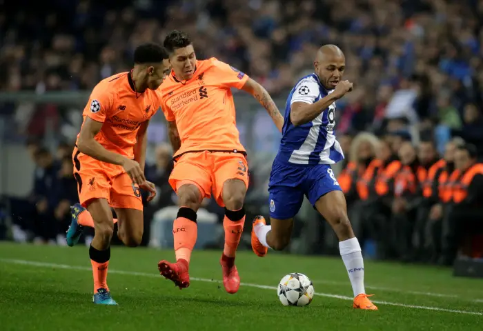 Soccer Football - Champions League Round of 16 First Leg - FC Porto vs Liverpool - Estadio do Dragao, Porto, Portugal - February 14, 2018   Porto's Yacine Brahimi in action with Liverpool's Roberto Firmino and Trent Alexander-Arnold