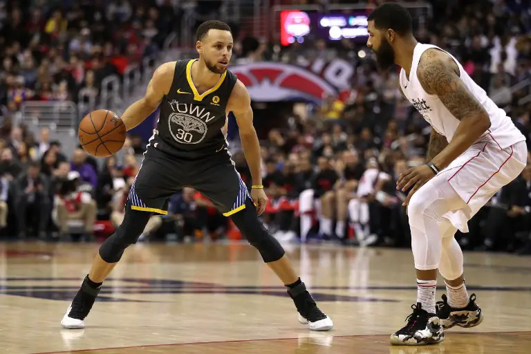 WASHINGTON, DC - FEBRUARY 28: Stephen Curry #30 of the Golden State Warriors dribbles against the Washington Wizards during the first half at Capital One Arena on February 28, 2018 in Washington, DC. NOTE TO USER: User expressly acknowledges and agrees that, by downloading and or using this photograph, User is consenting to the terms and conditions of the Getty Images License Agreement.   Patrick Smith/Getty Images/AFP