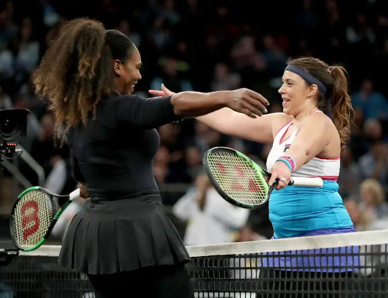 NEW YORK, NY - MARCH 05: Marion Bartoli of France congratulates Serena Williams of the United States after their match during the Tie Break Tens at Madison Square Garden on March 5, 2018 in New York City.   Elsa/Getty Images/AFP