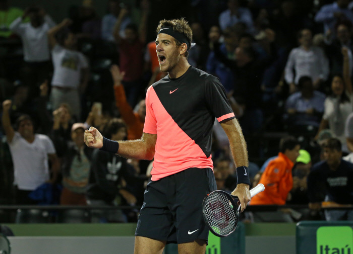 March 28, 2018 - Key Biscayne, FL, USA - Argentina's Juan Martin del Potro celebrates after defeating Milos Raonic of Canada, 5-7, 7-6, 7-6, during the quarterfinals of the Miami Open on Wednesday, March 28, 2018, at Crandon Park Tennis Center in Key Biscayne, Fla.