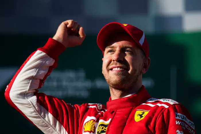 Race winner Sebastian Vettel (GER) Ferrari celebrates on the podium at Formula One World Championship, Rd1, Australian Grand Prix, Race, Melbourne, Australia, Sunday 25 March 2018.