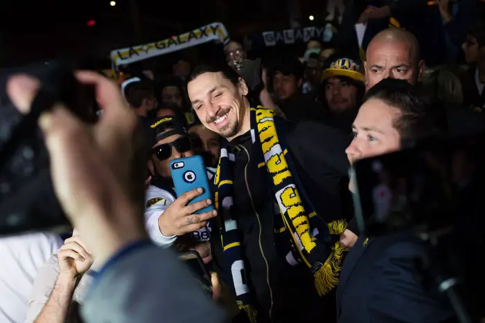 Zlatan Ibrahimovic player in MLS team LA Galaxy greets fans when he arrived at Los Angeles International Airport LAX on March 29, 2018 in Los Angeles