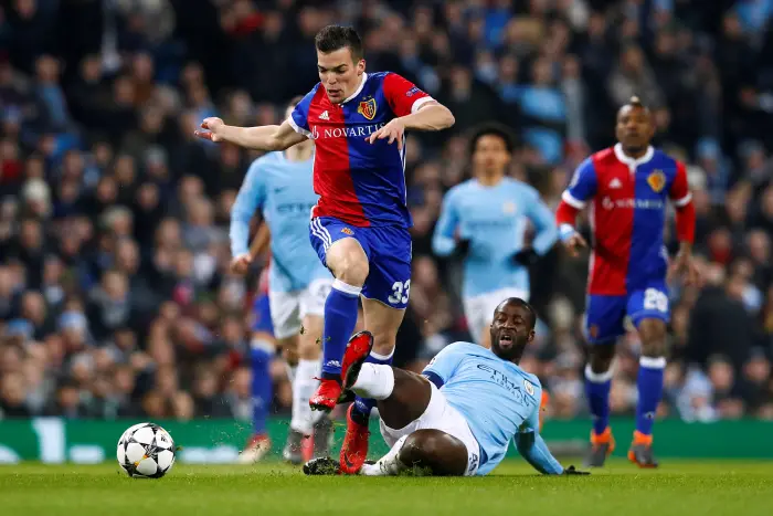 Soccer Football - Champions League Round of 16 Second Leg - Manchester City vs FC Basel - Etihad Stadium, Manchester, Britain - March 7, 2018   Basel¹s Kevin Bua in action with Manchester City's Yaya Toure