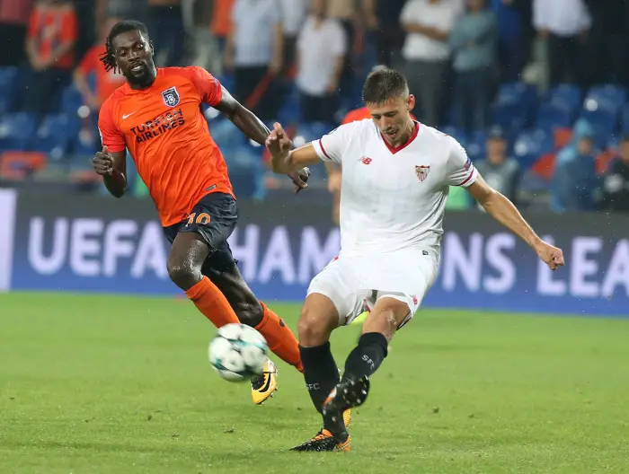 Emmanuel Adebayor of Basaksehir and Clement Lenglet of Sevilla during the UEFA Champions League Play Off first leg football match Medipol Basaksehir vs FC Sevilla, on August 16 2017 at the Basaksehir Fatih Terim Stadium in Istanbul , Turkey.