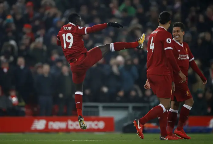Soccer Football - Premier League - Liverpool vs Newcastle United - Anfield, Liverpool, Britain - March 3, 2018   Liverpool's Sadio Mane celebrates scoring their second goal with Virgil van Dijk and Roberto Firmino